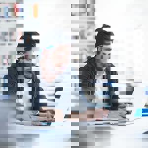 Man studying on laptop