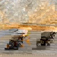 Truck full of rubble driving through gold mine